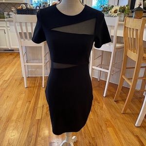 Express blk mesh cocktail mini bodycon dress.barely worn condition.Never dried